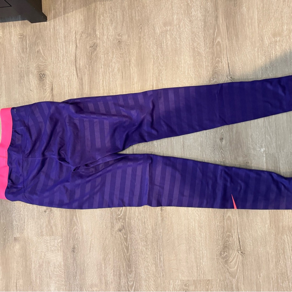 Women Purple and Pink Striped Nike leggings